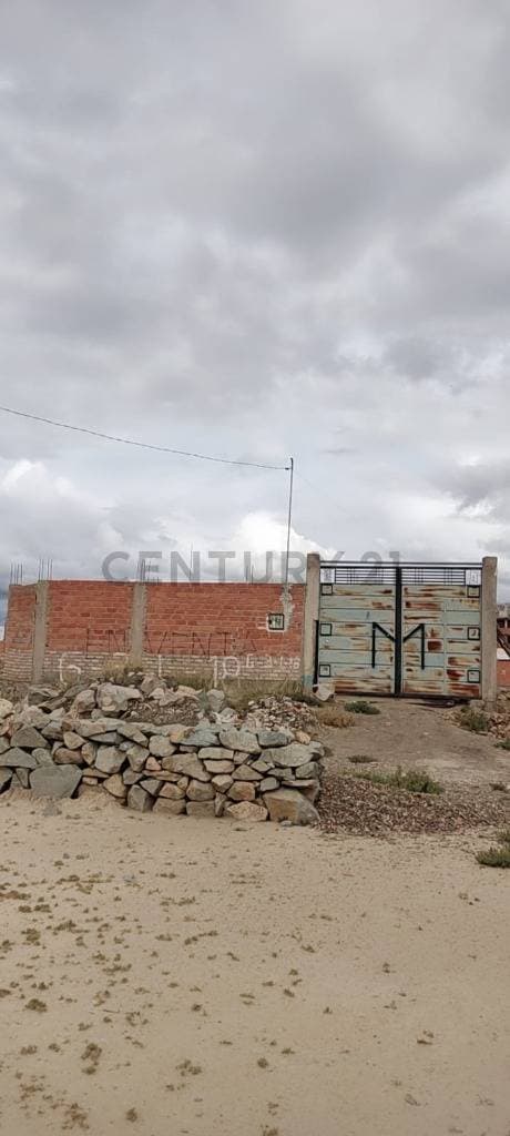 Terreno con construcción en obra gruesa